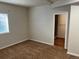 Cozy bedroom with carpet flooring, a window and access to a modern bathroom at 22822 E Union Cir, Aurora, CO 80015