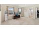 Versatile bonus room with neutral carpet, natural light, and ample space for various activities and entertainment at 2647 Gray Wolf Loop, Broomfield, CO 80023