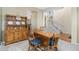 Cozy dining room with classic furniture, natural light, and a hutch for ample storage at 2647 Gray Wolf Loop, Broomfield, CO 80023