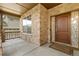 Welcoming front porch featuring stone accents, an elegant door, and decorative stained glass at 2647 Gray Wolf Loop, Broomfield, CO 80023