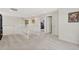 Spacious upstairs hallway with white railing, carpet floors, and doorways leading to various rooms, creating a bright and open feel at 2647 Gray Wolf Loop, Broomfield, CO 80023