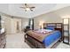 Spacious main bedroom with a ceiling fan and a comfortable-looking bed at 2647 Gray Wolf Loop, Broomfield, CO 80023
