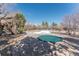 Community pool featuring a covered section and surrounding trees and foliage at 11277 Osage Cir # E, Westminster, CO 80234