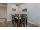 A cozy dining room with wood floors, a wooden table, and charming decor that creates a warm atmosphere at 11277 Osage Cir # E, Westminster, CO 80234