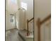 Bright entryway with high ceilings, a staircase, and natural light streaming in from above at 11277 Osage Cir # E, Westminster, CO 80234
