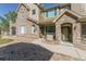 Charming townhome with stone facade, walkway, and well-maintained landscaping in a desirable community at 11277 Osage Cir # E, Westminster, CO 80234