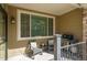 Relaxing outdoor patio with seating, BBQ grill, and stone accents for comfortable outdoor living at 11277 Osage Cir # E, Westminster, CO 80234