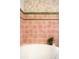 Close-up of vintage pink tile in bathroom at 6285 W 35Th Ave, Wheat Ridge, CO 80033
