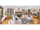 Inviting living room with fireplace, hardwood floors, natural light, and comfortable seating at 6285 W 35Th Ave, Wheat Ridge, CO 80033