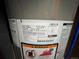 View of water heater showing details for gas type, serial number, and manufacturing date at 9852 W 76Th Ave, Arvada, CO 80005
