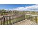 Deck overlooking a wetland with a blue sky and some clouds at 5335 S Lisbon Way, Centennial, CO 80015