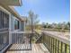 Cozy deck showcasing outdoor living with backyard view and stair access to the yard at 5335 S Lisbon Way, Centennial, CO 80015