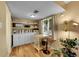Bright dining area with a table, chairs, and ample storage cabinets with shelving at 6650 E Arizona Ave # 163, Denver, CO 80224