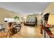 Open-concept living area with hardwood floors, comfortable seating, and plenty of natural light at 6650 E Arizona Ave # 163, Denver, CO 80224