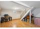 Open basement area with wood flooring and lots of storage space at 11228 W 18Th Ave, Lakewood, CO 80215