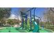 Community playground with slides and climbing structures at 11228 W 18Th Ave, Lakewood, CO 80215