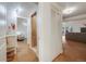 Hallway bathroom featuring a shower with glass, a sink, and views of a living room and bedroom at 1559 Lisbon Dr, Parker, CO 80138