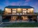 Stunning two-story home with a large deck, outdoor entertaining area, and a beautifully landscaped yard at 1559 Lisbon Dr, Parker, CO 80138