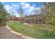 Picture of a backyard featuring a patio area, manicured lawn, and landscaped garden at 8015 Lt William Clark Rd, Parker, CO 80134