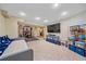 Open-concept basement with workout area, large TV, and play space, perfect for entertainment and fitness at 8015 Lt William Clark Rd, Parker, CO 80134