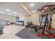 Spacious basement area with exercise equipment and play area; a versatile space for recreation and relaxation at 8015 Lt William Clark Rd, Parker, CO 80134