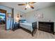Cozy bedroom with a bed, dresser, decor and ample space at 8015 Lt William Clark Rd, Parker, CO 80134