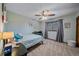 Nicely decorated bedroom featuring a comfortable bed, desk and ample natural light at 8015 Lt William Clark Rd, Parker, CO 80134