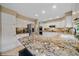 Modern kitchen featuring granite countertops and stainless steel appliances at 8015 Lt William Clark Rd, Parker, CO 80134