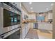 Updated kitchen with modern stainless steel appliances and lots of storage at 8015 Lt William Clark Rd, Parker, CO 80134