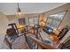 Bright living room featuring hardwood floors, many windows, high ceilings and comfortable seating at 8015 Lt William Clark Rd, Parker, CO 80134
