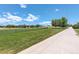 Baseball field in community with paved walking path and beautiful blue skies at 709 S Depew St, Lakewood, CO 80226
