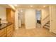 Finished basement with a kitchenette and laundry access at 709 S Depew St, Lakewood, CO 80226