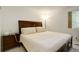 Bedroom with a full bed, side table and nice window lighting at 709 S Depew St, Lakewood, CO 80226