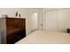 Well-lit bedroom featuring a large wardrobe and good lighting at 709 S Depew St, Lakewood, CO 80226