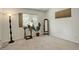 Carpeted secondary bedroom offers neutral decor and good natural light at 709 S Depew St, Lakewood, CO 80226