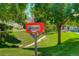 Community book exchange box near homes and green area at 709 S Depew St, Lakewood, CO 80226