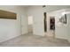 Bright main bedroom with an attached bathroom and walk-in closet at 709 S Depew St, Lakewood, CO 80226