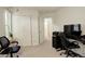 Home office with an open floor plan, and neutral carpet at 709 S Depew St, Lakewood, CO 80226