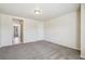 Spacious bedroom features plush carpet and neutral paint, perfect for creating a relaxing retreat at 19471 W 59Th Ave, Golden, CO 80403