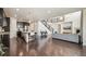 Open concept living features a great kitchen, large staircase, and spacious living room at 19471 W 59Th Ave, Golden, CO 80403