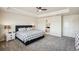 Spacious main bedroom with tray ceilings, ensuite bath and large windows for ample natural light at 19471 W 59Th Ave, Golden, CO 80403