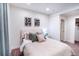 Comfortable bedroom featuring neutral tones, stylish decor, and ample natural light at 10669 Worchester Dr, Commerce City, CO 80022