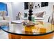 Modern glass-topped coffee table adorned with decorative elements at 10669 Worchester Dr, Commerce City, CO 80022