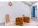 A cozy basement corner featuring unique decor and comfortable floor cushions at 10669 Worchester Dr, Commerce City, CO 80022