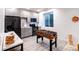 Close-up of the kitchenette area, featuring gray cabinets and modern appliances at 10669 Worchester Dr, Commerce City, CO 80022