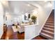 Bright, open living room flows into the dining and staircase areas at 10669 Worchester Dr, Commerce City, CO 80022