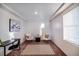 Office space with light-filled space and room for dual chairs and a desk at 10669 Worchester Dr, Commerce City, CO 80022