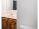 Bathroom featuring a wood vanity and a mirror above the sink at 3246 S Nucla St, Aurora, CO 80013