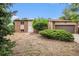 Charming two-story home featuring a brick facade, well-maintained landscaping, and a two-car garage at 3246 S Nucla St, Aurora, CO 80013