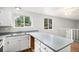 Well-lit kitchen with lots of counter space, and views of the surrounding property at 3246 S Nucla St, Aurora, CO 80013